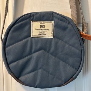 Orion London Blue Round Crossbody Bag